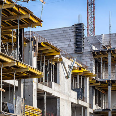 Concrete Slab Falls from Apartment Building Construction Site, Injuring Pedestrian