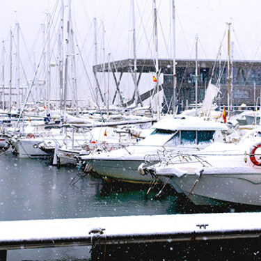 Heavy Snow Causes Marina Roof Collapse, Damaging Over 20 Boats